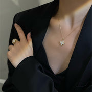 Rotating Four-Leaf Clover Zirconia Ring & Necklace
