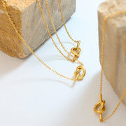Eclair Golden Knot Necklace